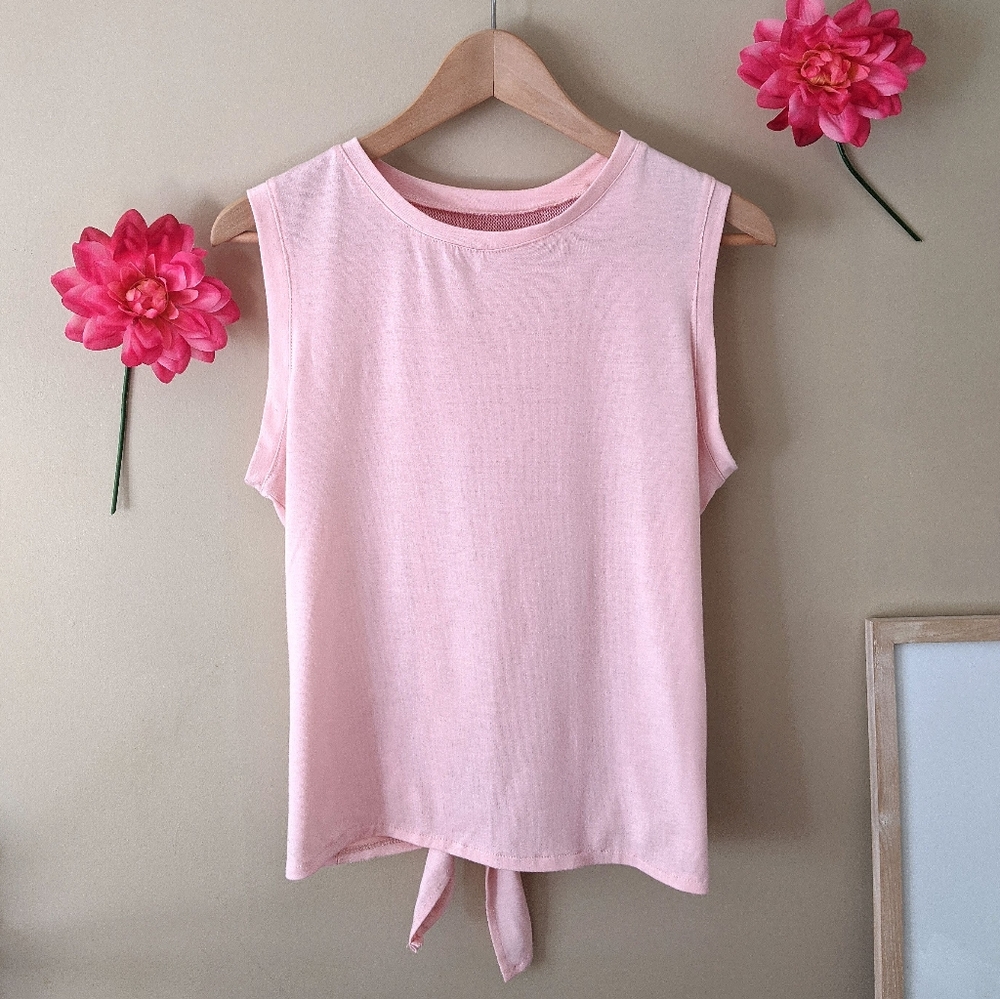 light pink soft workout top with bottom knot tie, medium